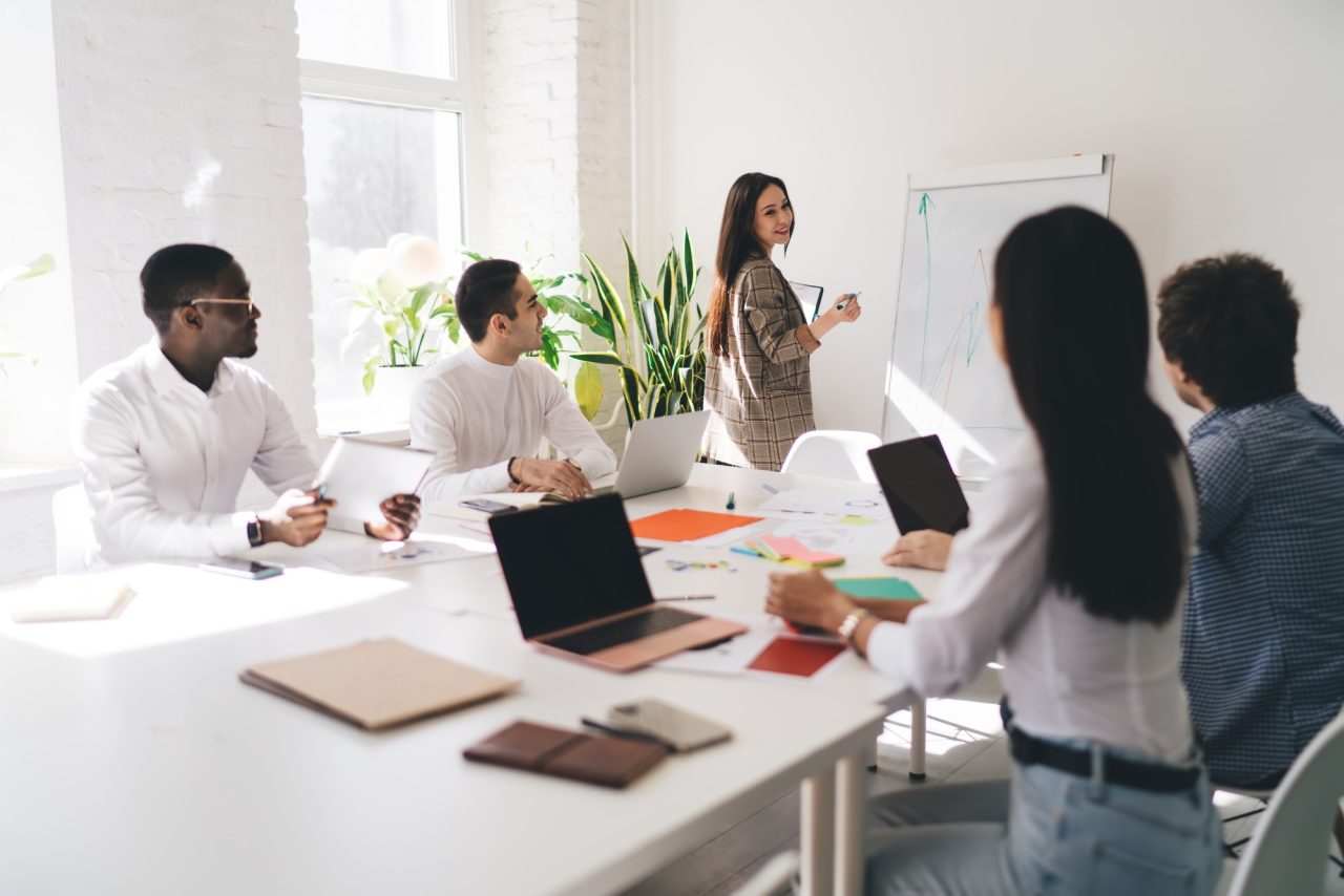 Contact Vestaxis team discussing IT consulting strategies in a meeting room